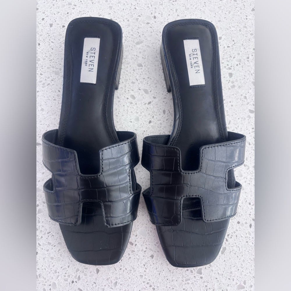 Size 9.5 Steven by Steve Madden Black Croc-Embossed Slide Mules.
